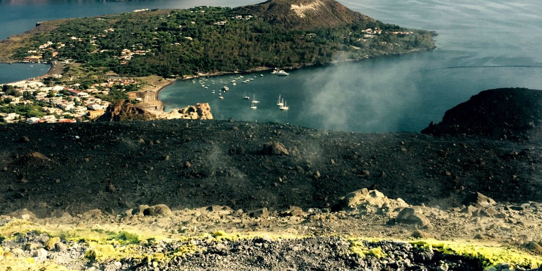 Sulpher vents and boats in the harbour, Vulcano, Sicily