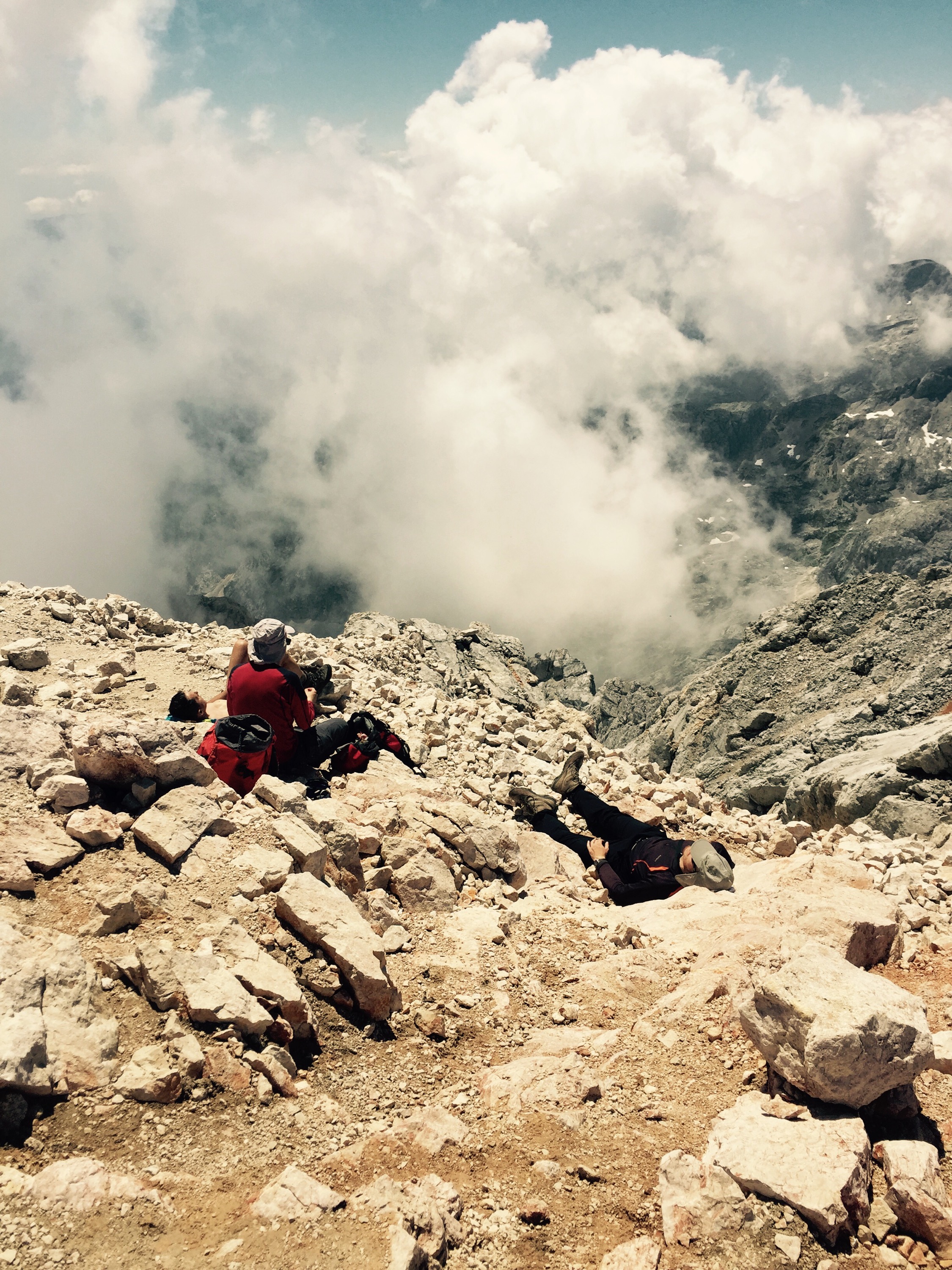 Mountaineer sleeping on the summit, Triglav