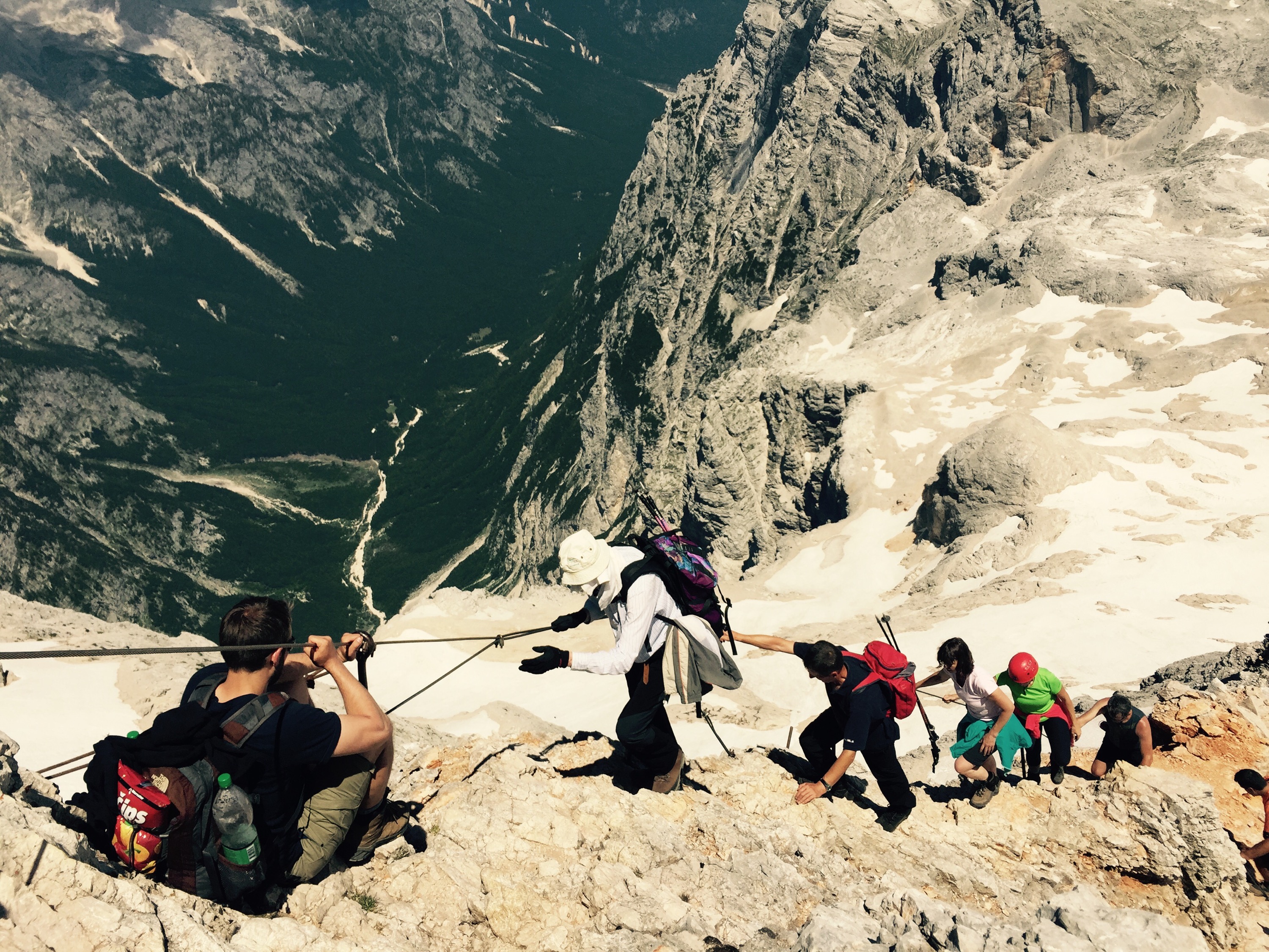 Nils Raabe waiting to descend the ridge, Triglav