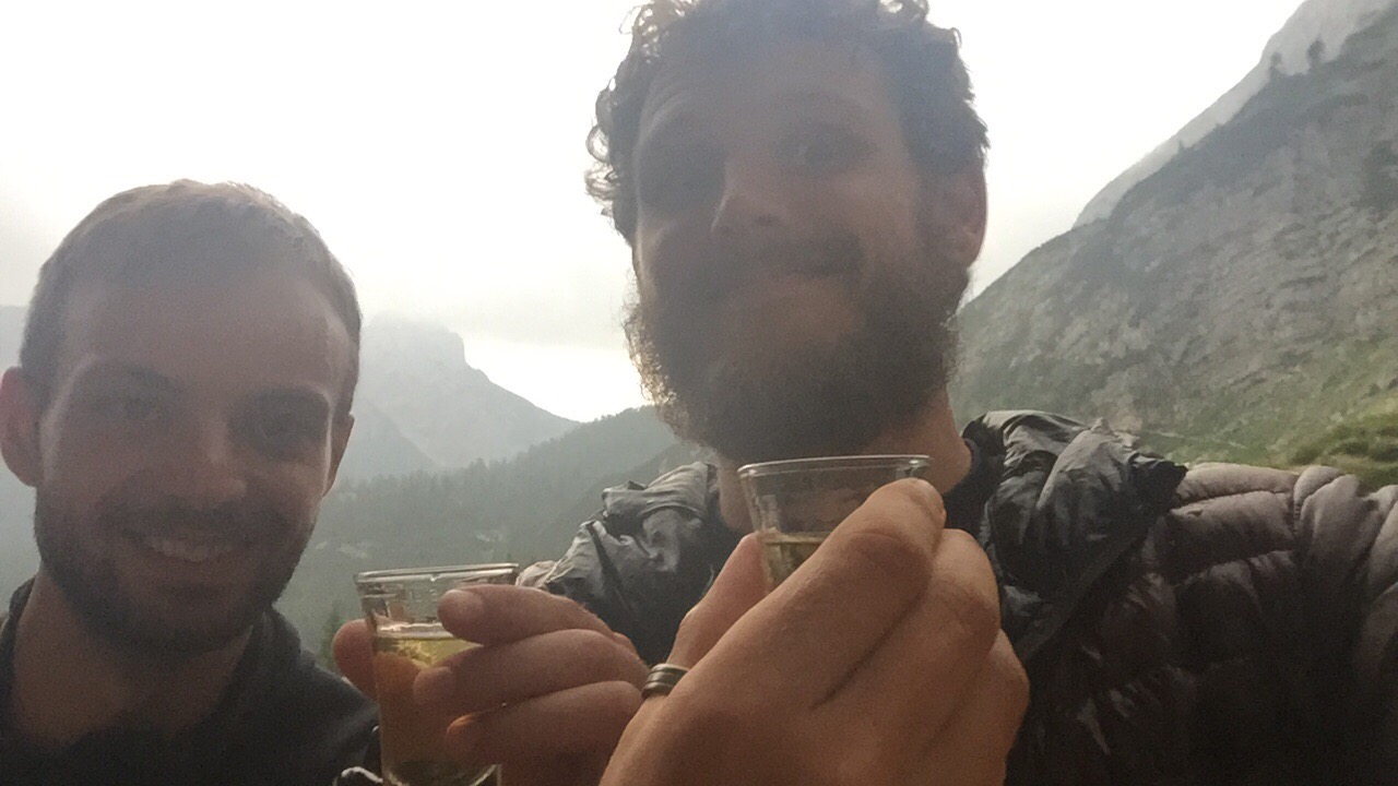 Nils Raabe and Paul Ferguson, toast with schnapps, Vodnikov Dom, Triglavski National Park