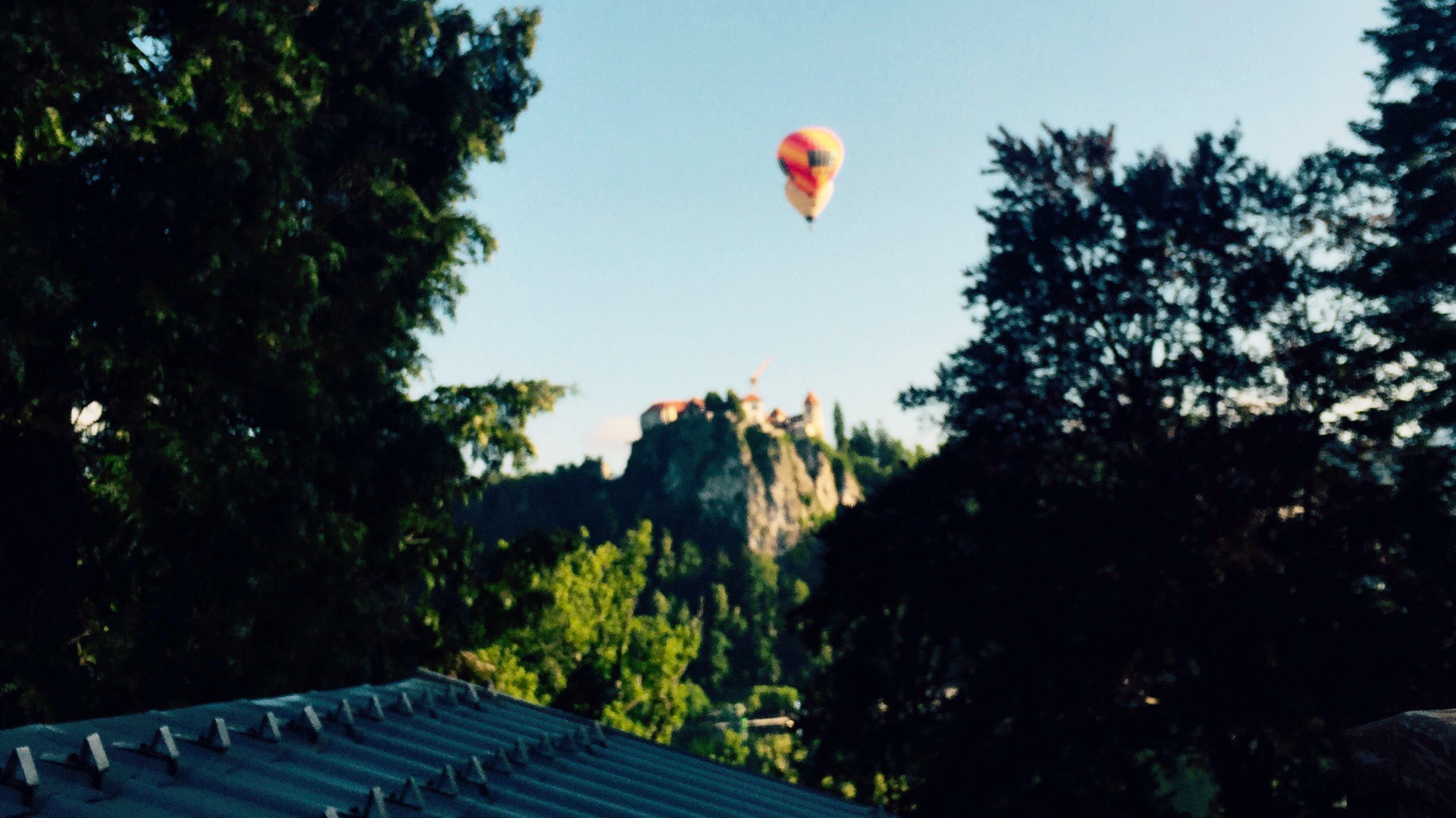 Hot air balloons over Bled castle, Slovenia