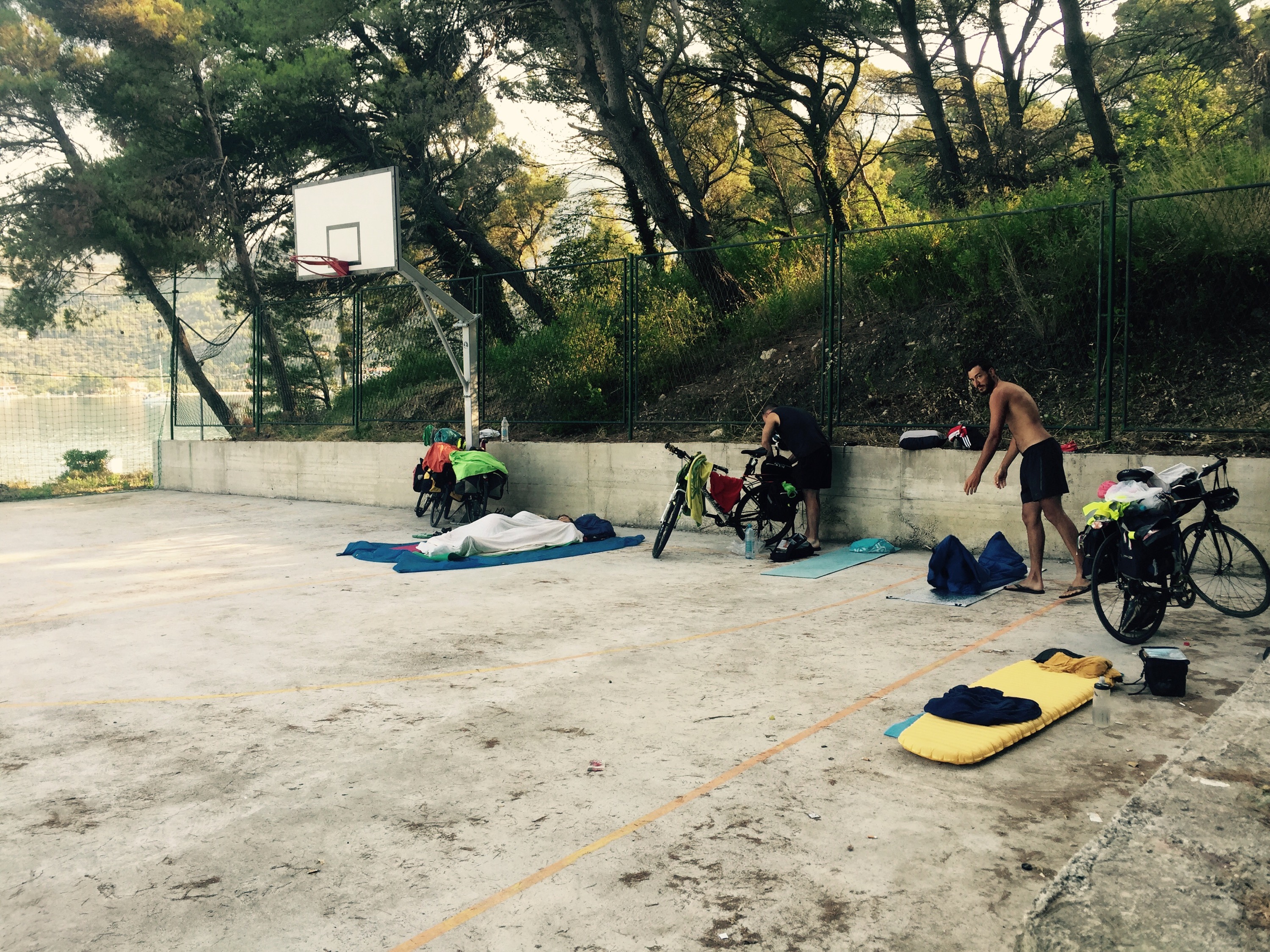 Sleeping in basketball court, Slano, Croatia