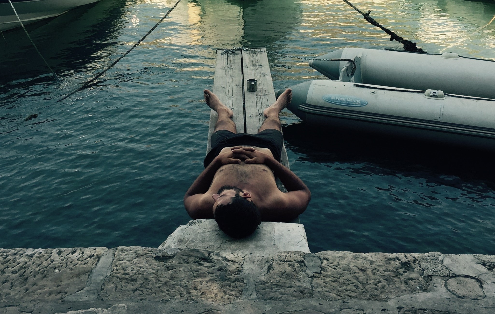 Rider sleeping, Dubrovnik harbor, Croatia