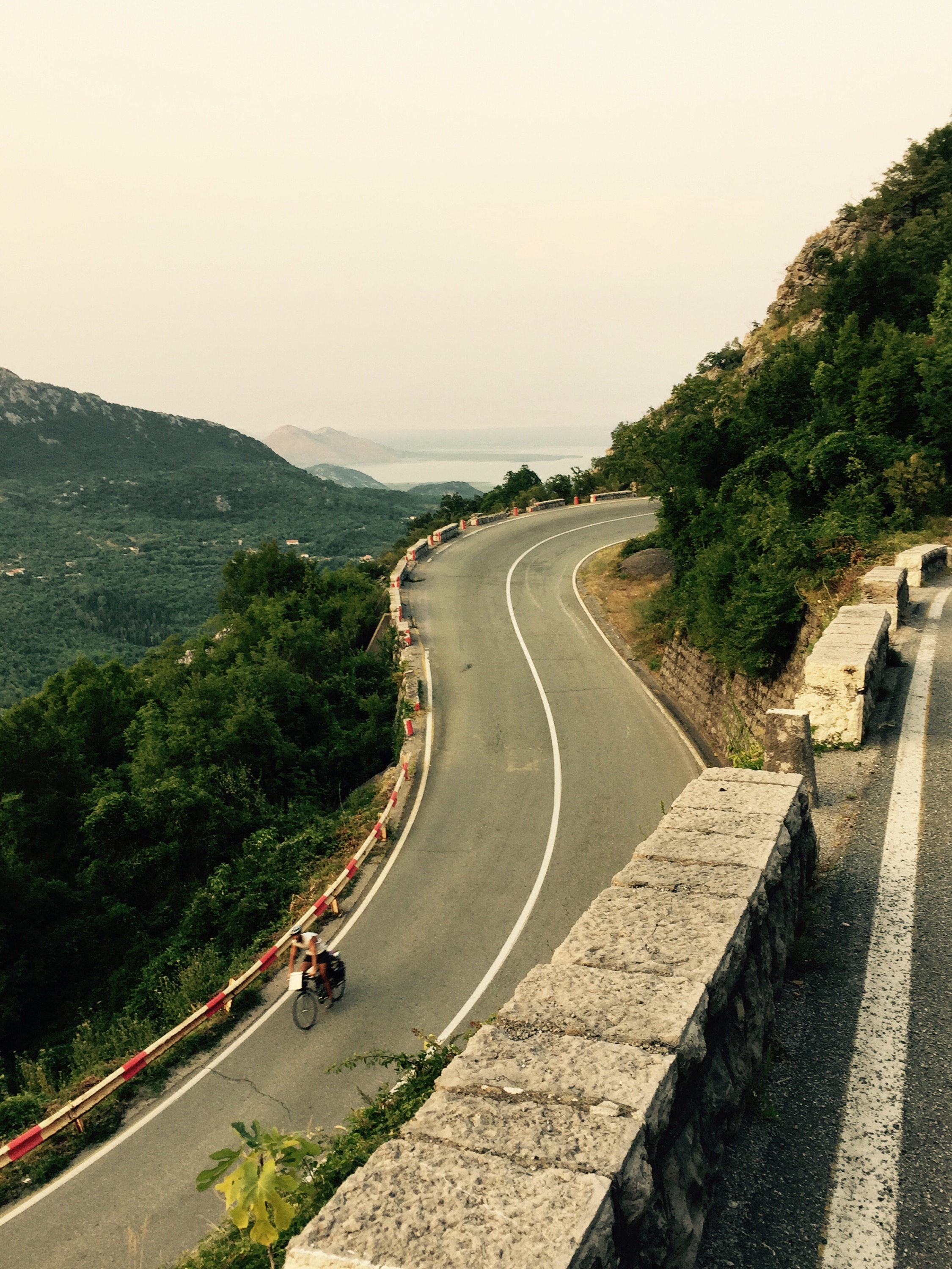 Rider descending towards Lake Shkodar, Montenegro