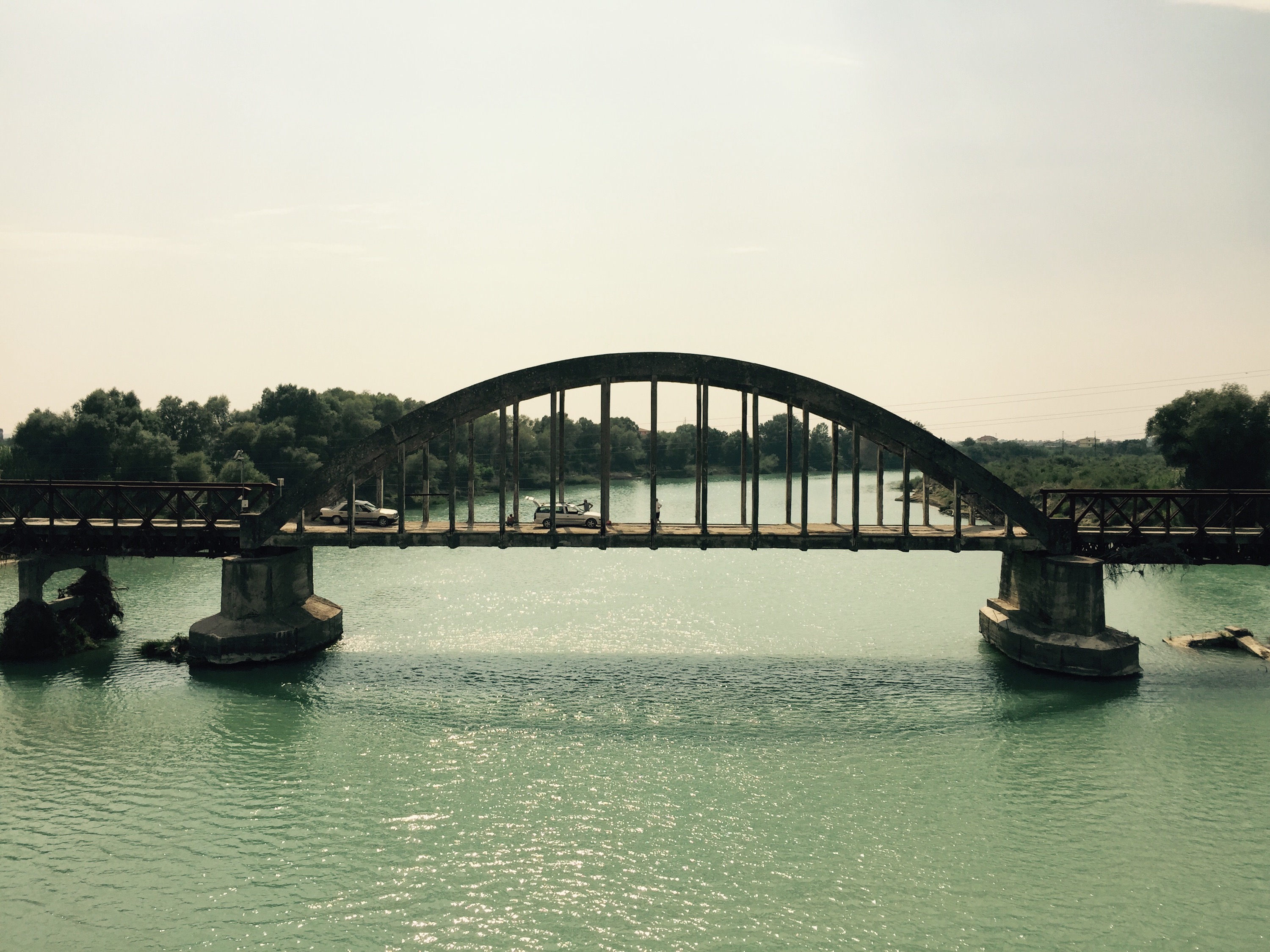 Fishing off old bridge, Albania